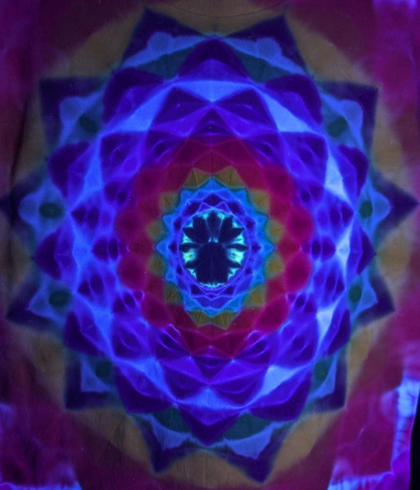 Small 12 Point Mandala Both Sides with Blacklight Reactive Center Tie Dye on a Tultex 290 Ringspun Cotton T-Shirt.