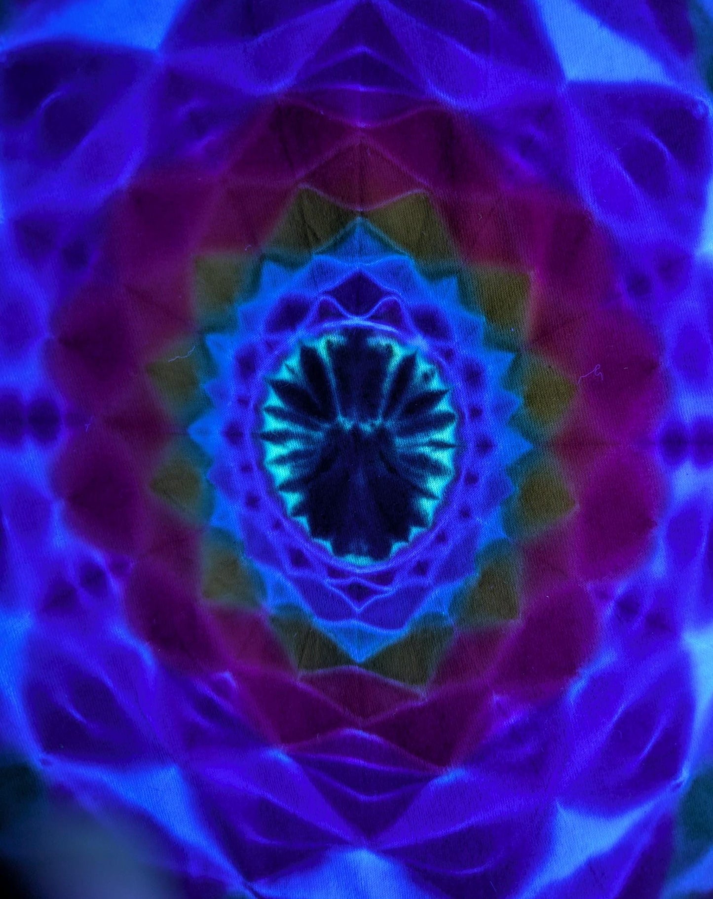 Small 12 Point Mandala Both Sides with Blacklight Reactive Center Tie Dye on a Tultex 290 Ringspun Cotton T-Shirt.