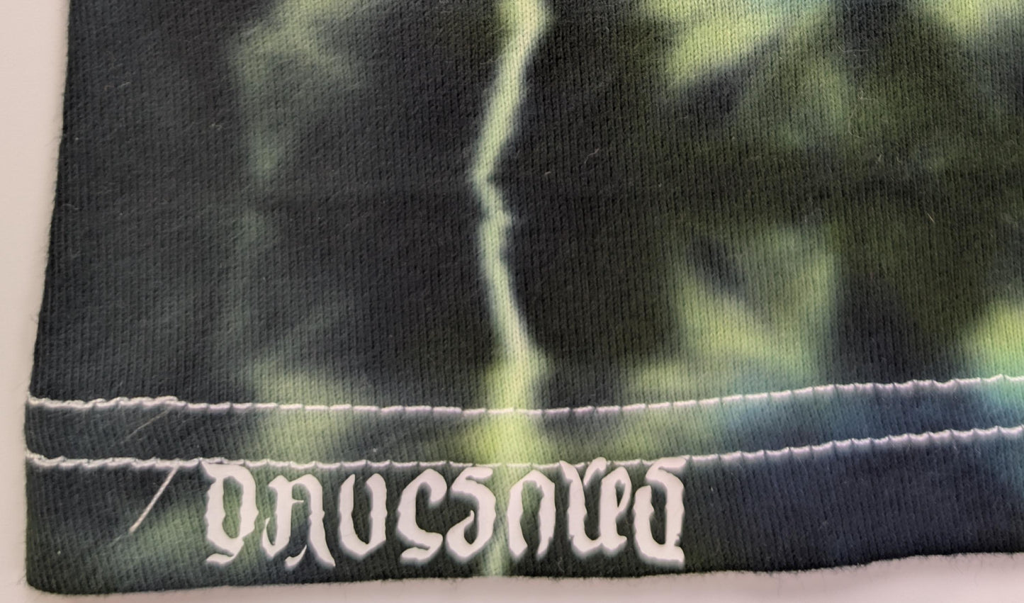 Medium Glitch UV Reactive Tie Dye on a Tultex 290 Ringspun Cotton T-Shirt