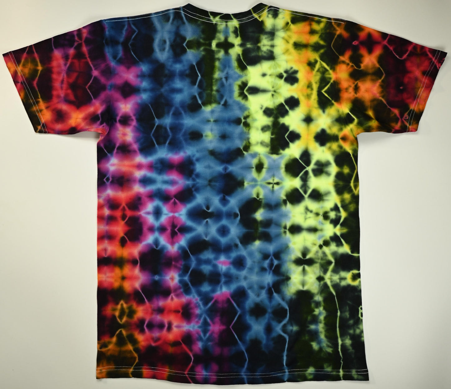 Medium Glitch UV Reactive Tie Dye on a Tultex 290 Ringspun Cotton T-Shirt