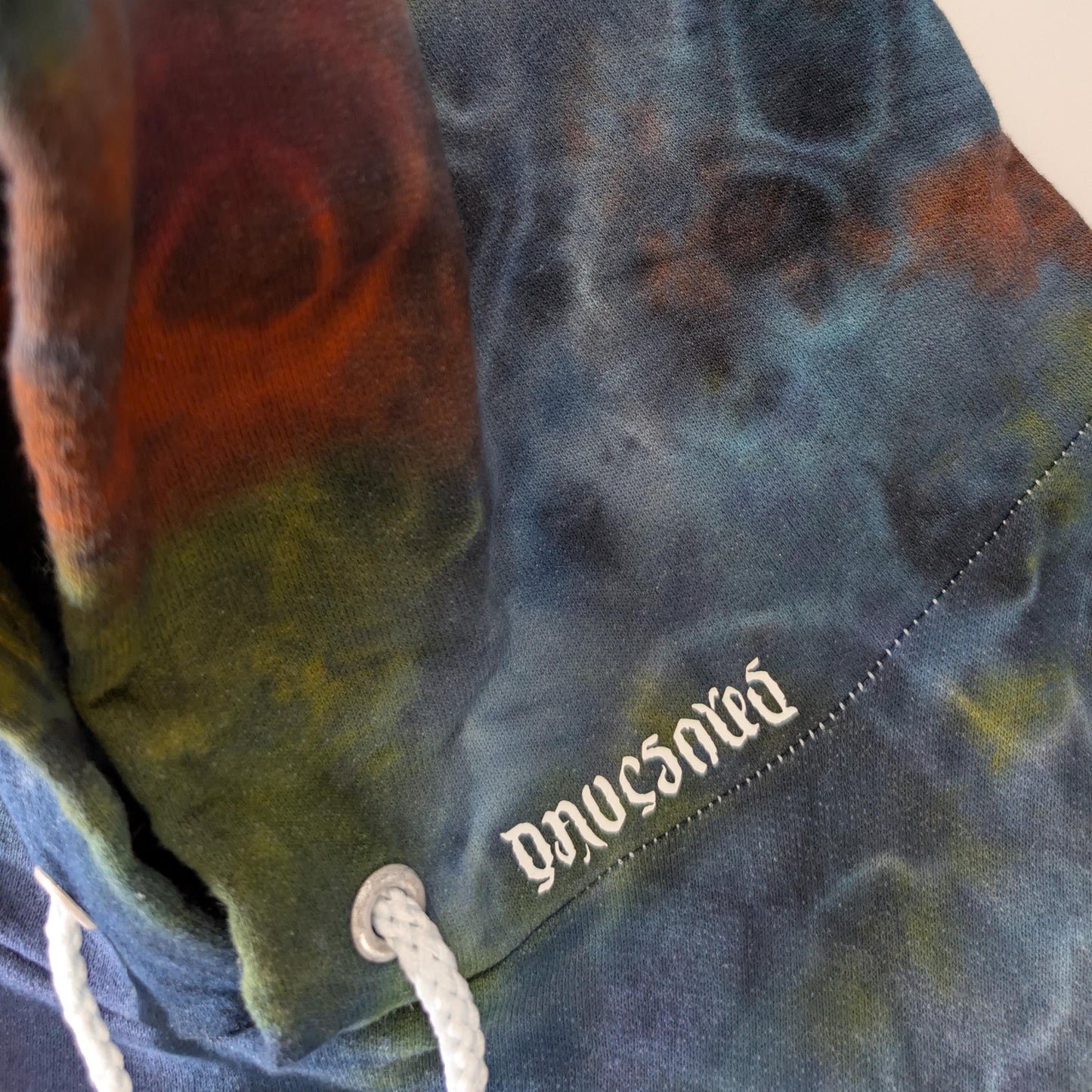 2X Double Dyed Tie Dye On a Hanes Ultimate Cotton Pullover Hoodie.