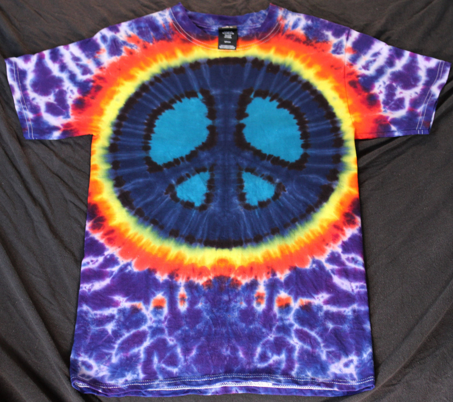 Small Peace Sign Tie Dye on a Premium Hanes Beefy Ringspun Cotton T-shirt