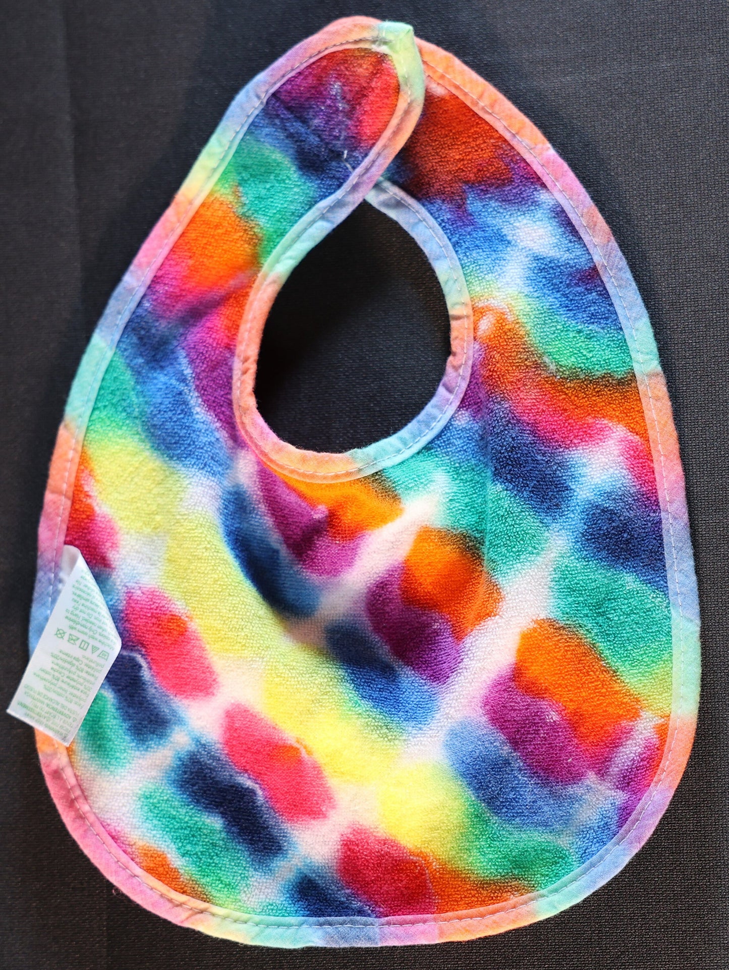 3-12 Months Tie Dye on a Green Sprouts Baby Bib