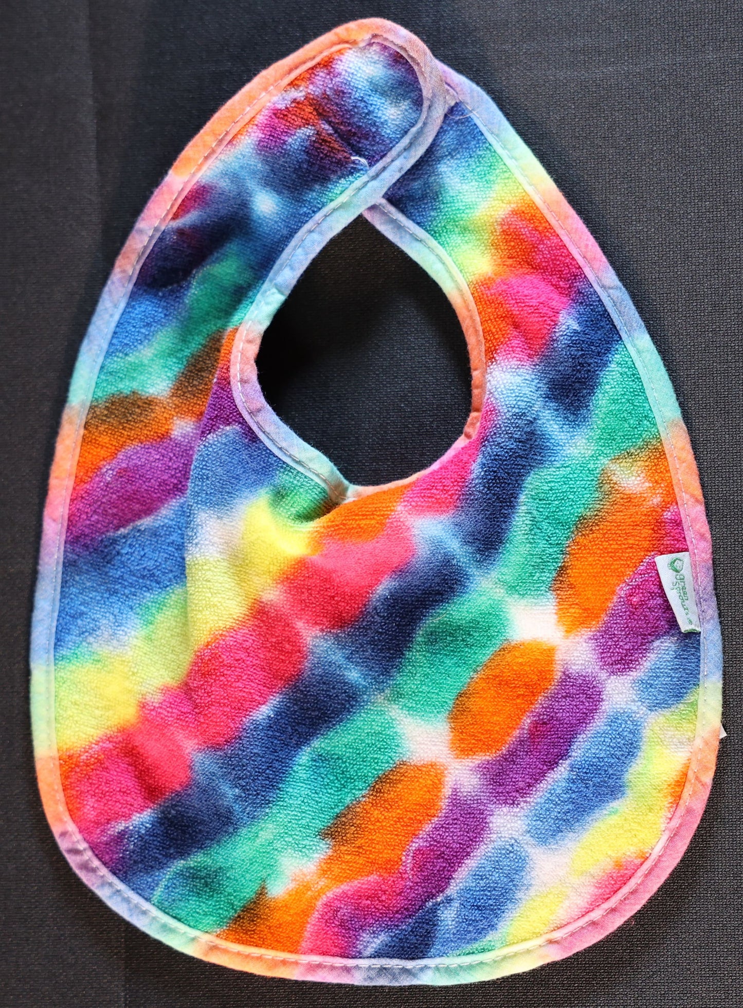 3-12 Months Tie Dye on a Green Sprouts Baby Bib