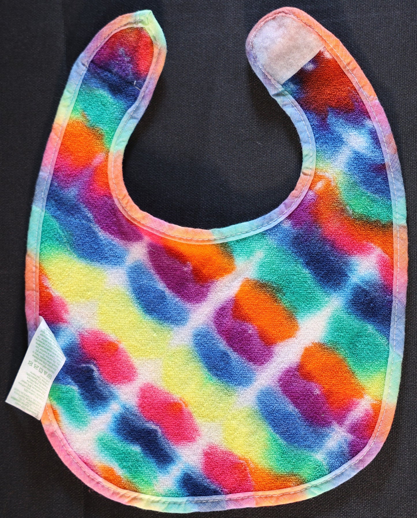 3-12 Months Tie Dye on a Green Sprouts Baby Bib
