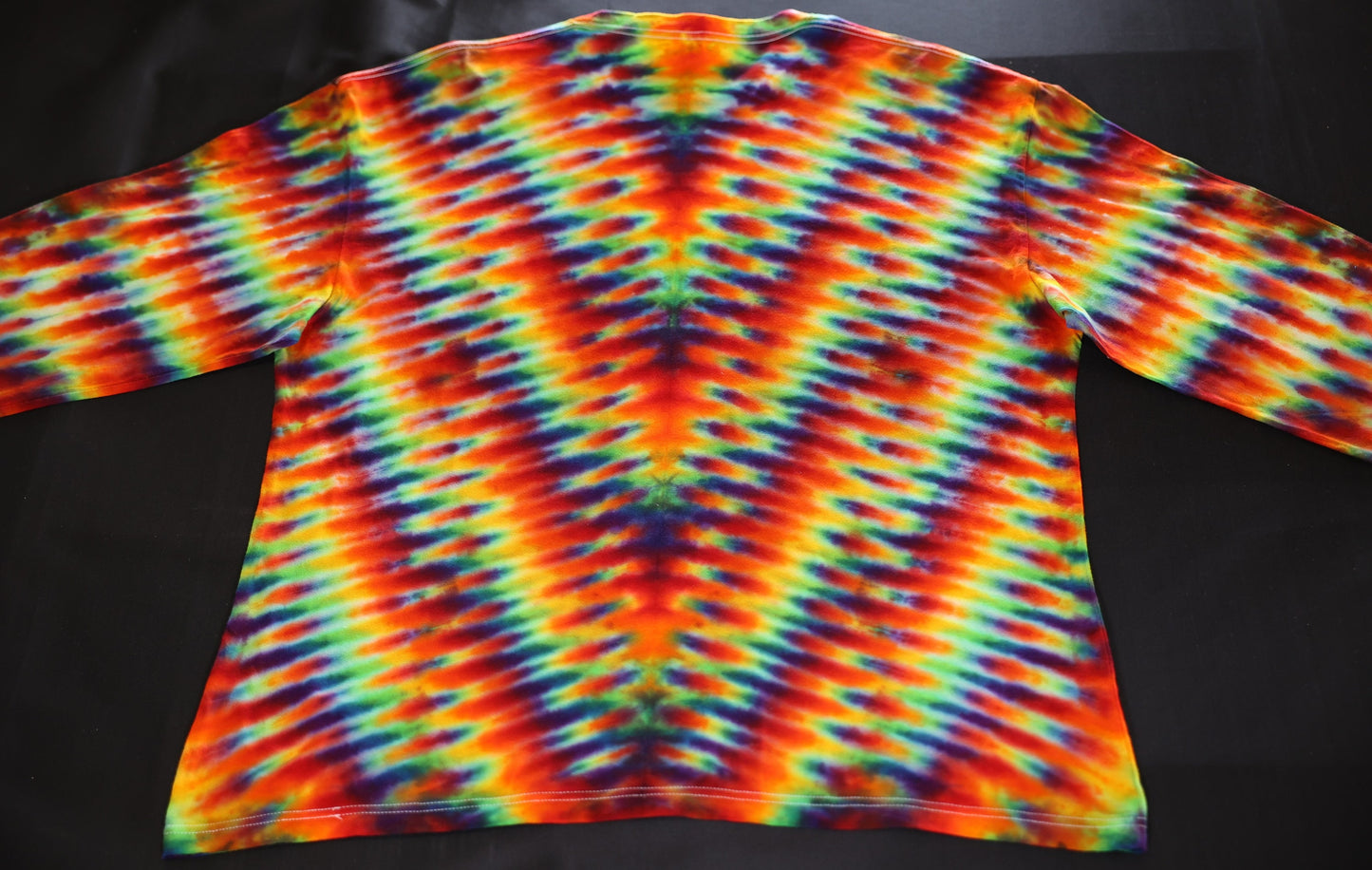2X Trippy Weaver Variation/Deep V Pleat Tie Dye on a Gildan Hammer Ringspun Cotton Long Sleeve Shirt