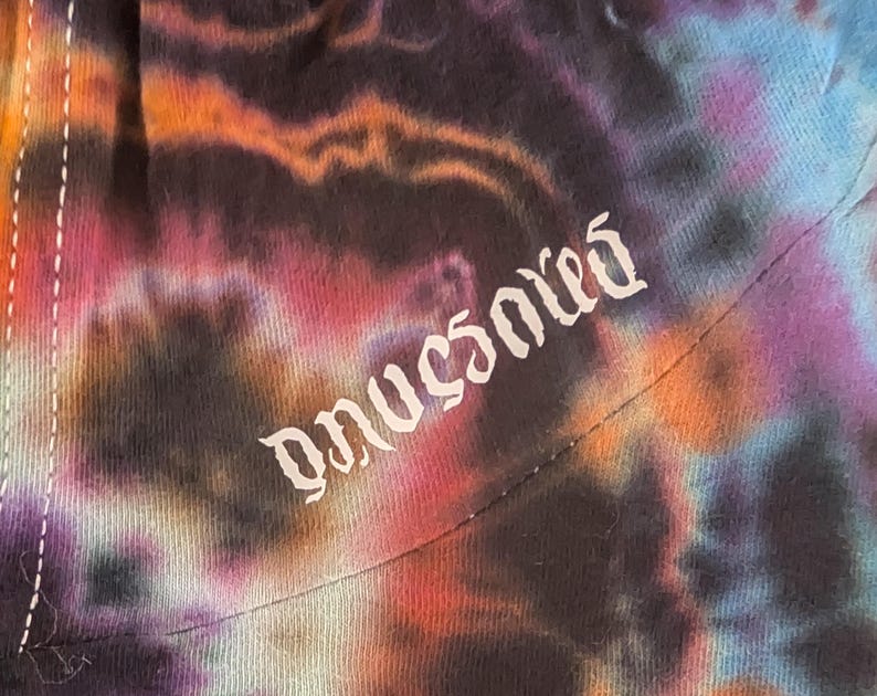 2X UV Reactive Cosmic Egg/Geode Hybrid Tie Dye in my Neon Vortex Palette on a Bella + Canvas 3512 Unisex Jersey Long-Sleeve Hoodie