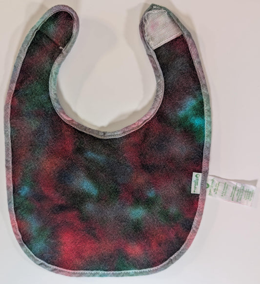 3-12 Scrunch in Greens, Reds & Black Tie Dye on a Green Sprouts Baby Bib