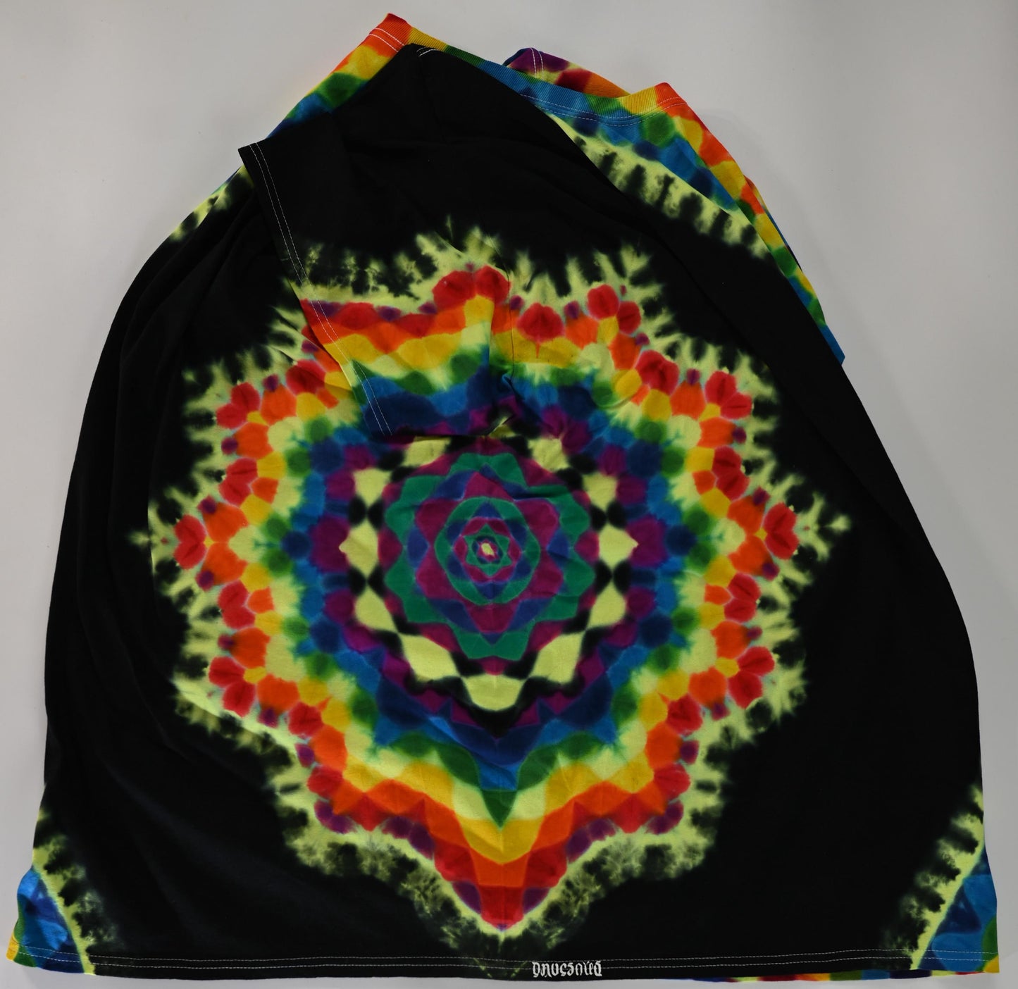 4X UV Reactive Side Hexagon (Gemstone Colors)-> {12/3} Dodecagram/Pac-Man Honeycomb/Black Between Tie Dye on a Port & Company Essential Tee