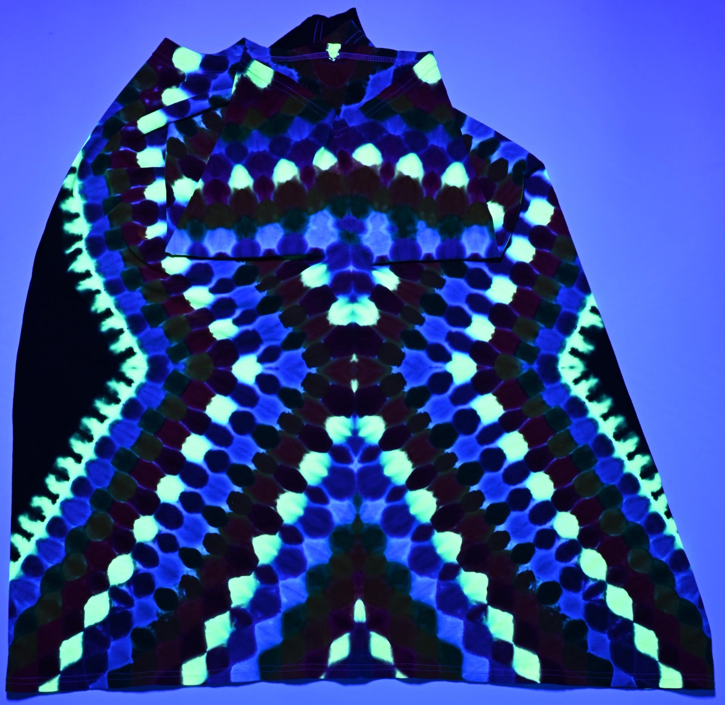 4X UV Reactive Side Hexagon (Gemstone Colors)-> {12/3} Dodecagram/Pac-Man Honeycomb/Black Between Tie Dye on a Port & Company Essential Tee