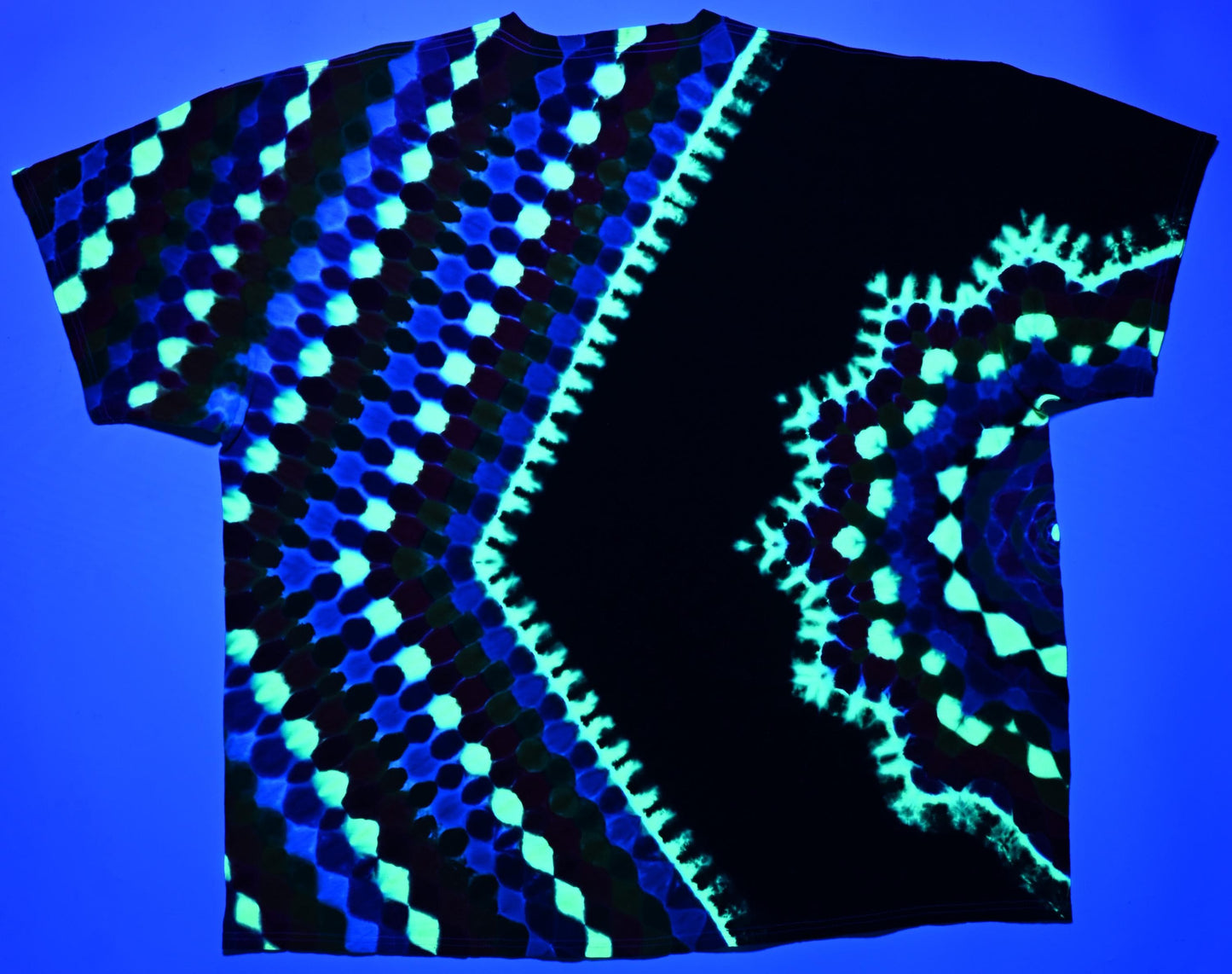 4X UV Reactive Side Hexagon (Gemstone Colors)-> {12/3} Dodecagram/Pac-Man Honeycomb/Black Between Tie Dye on a Port & Company Essential Tee