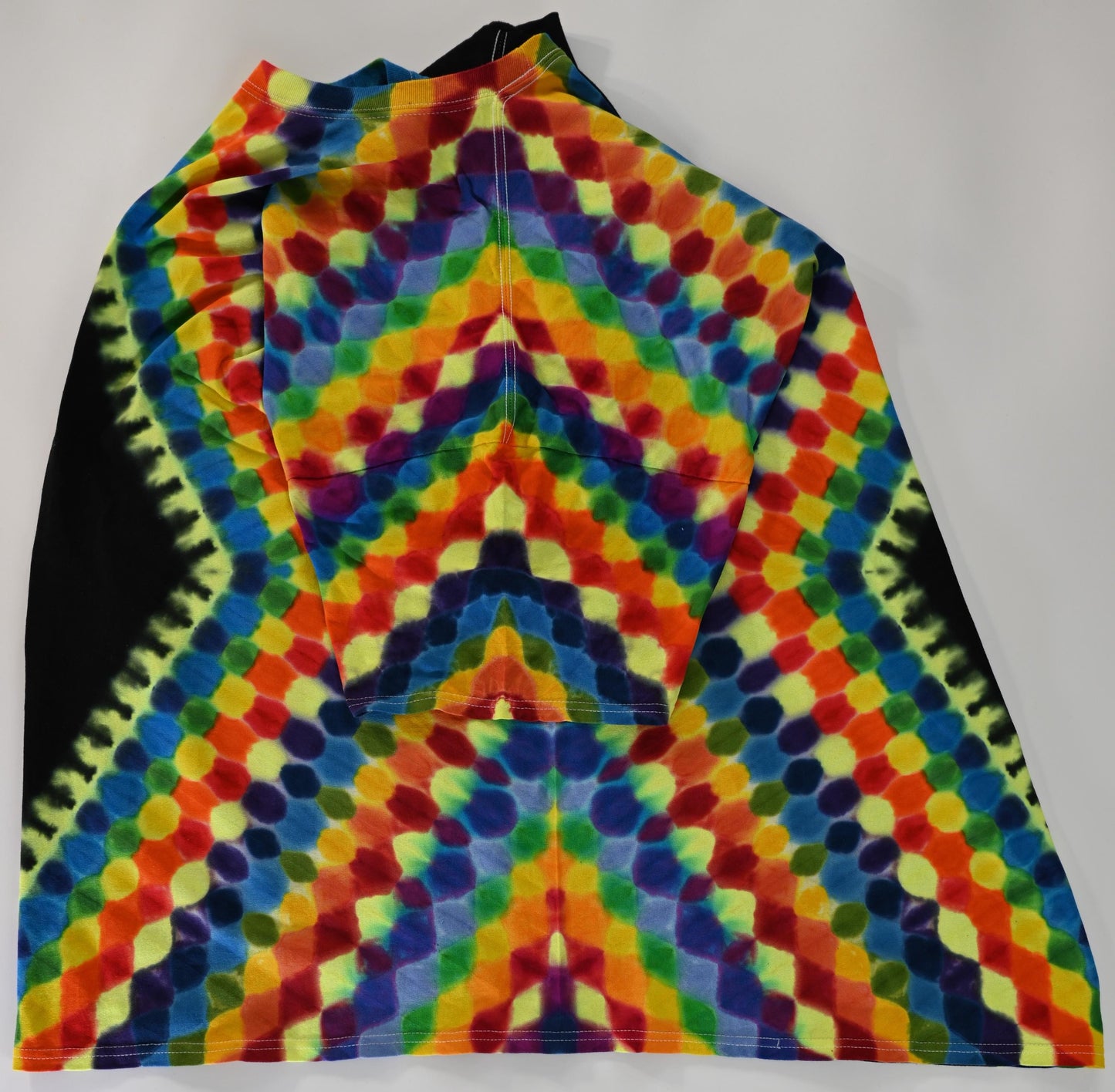 4X UV Reactive Side Hexagon (Gemstone Colors)-> {12/3} Dodecagram/Pac-Man Honeycomb/Black Between Tie Dye on a Port & Company Essential Tee