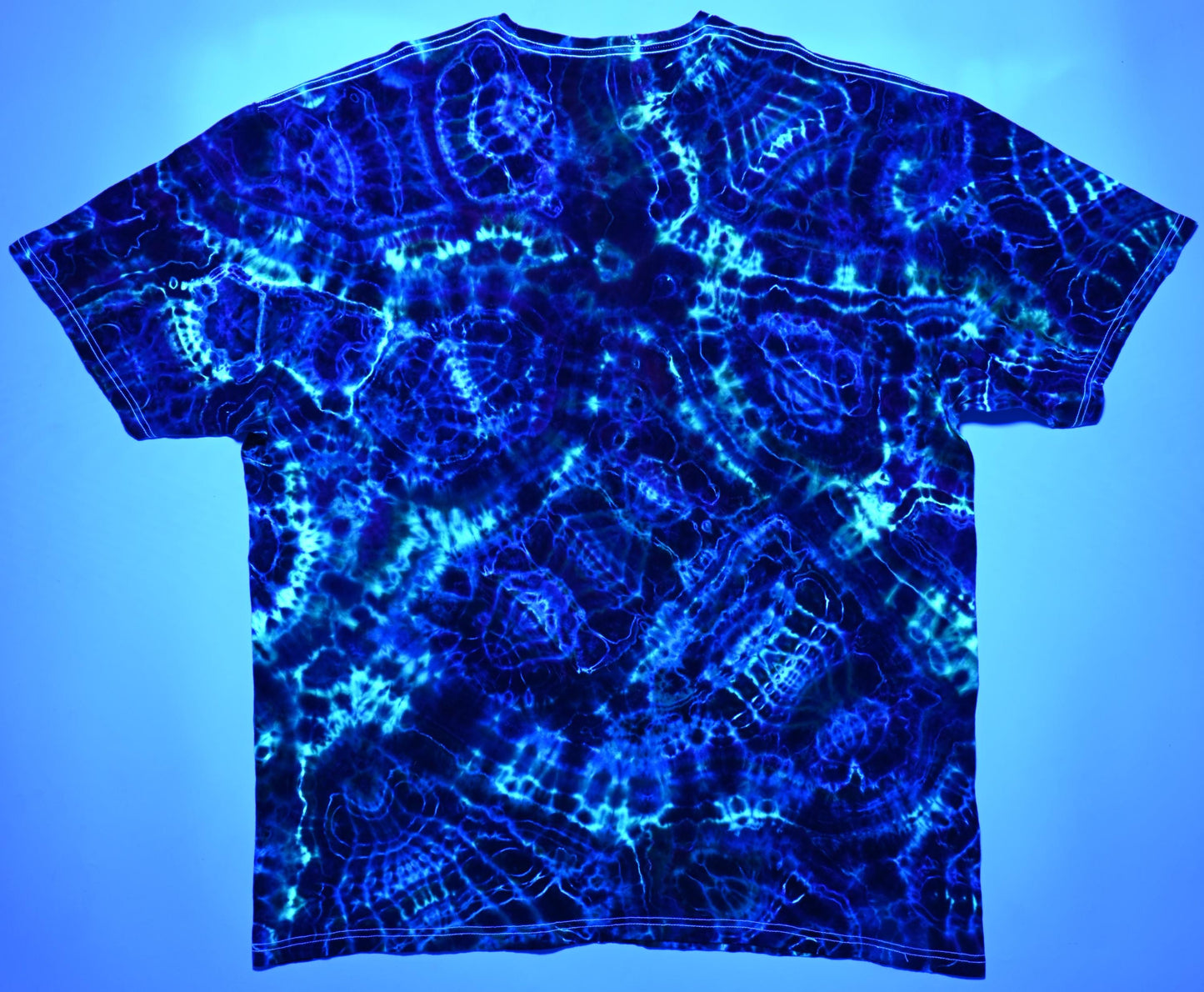 3X UV Reactive Cosmic Egg/Geode Hybrid Tie Dye in my Ethereal Pulse (plus UV Reactive) Color Palette on a Tultex 290 Ringspun Cotton T-Shirt