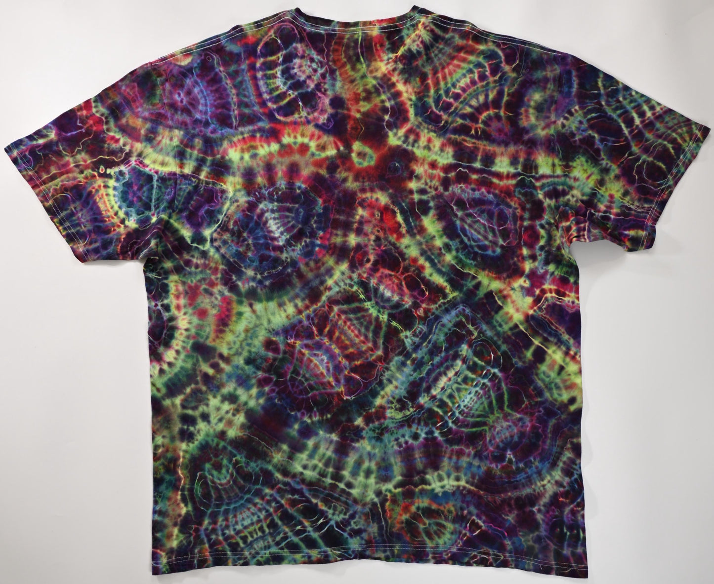 3X UV Reactive Cosmic Egg/Geode Hybrid Tie Dye in my Ethereal Pulse (plus UV Reactive) Color Palette on a Tultex 290 Ringspun Cotton T-Shirt