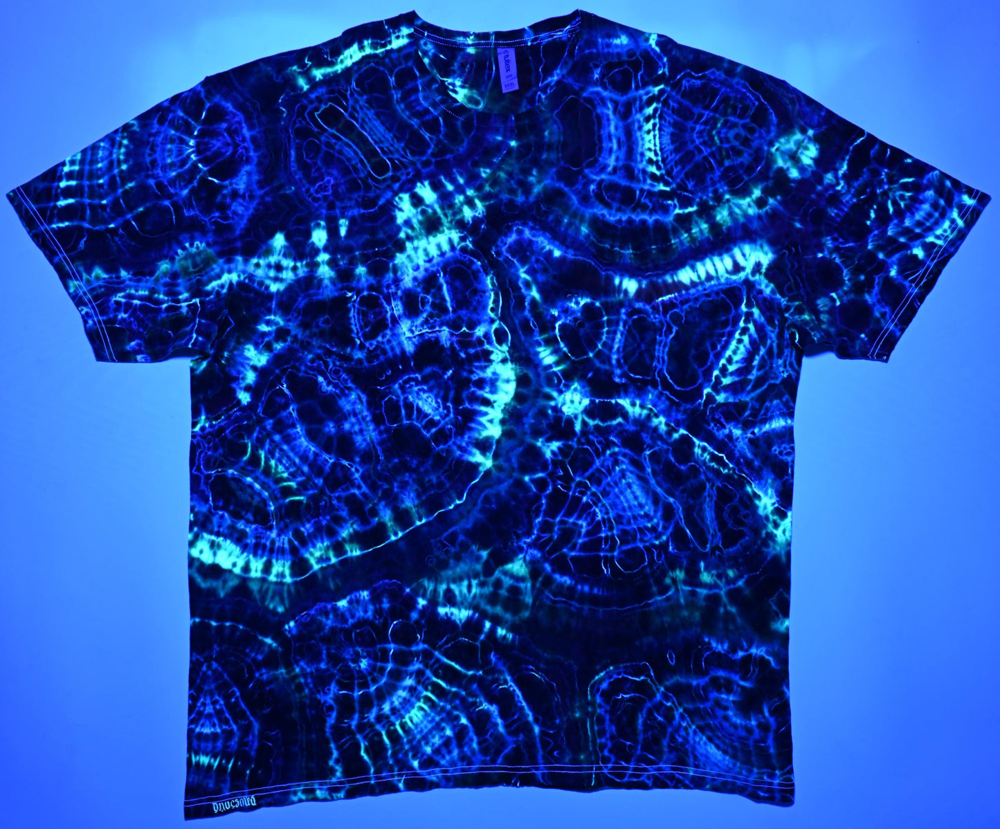 3X UV Reactive Cosmic Egg/Geode Hybrid Tie Dye in my Ethereal Pulse (plus UV Reactive) Color Palette on a Tultex 290 Ringspun Cotton T-Shirt