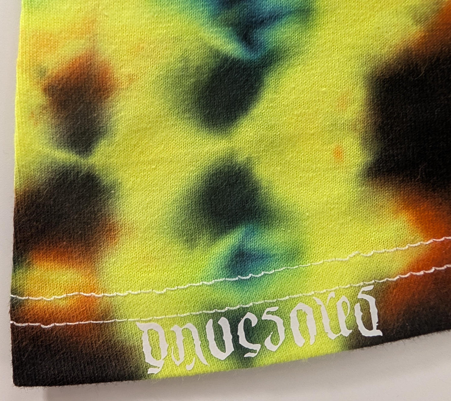 Large Glitch Tie Dye in my "Neon Vortex" UV Reactive Color Palette on a Tultex 290 Ringspun Cotton T-Shirt