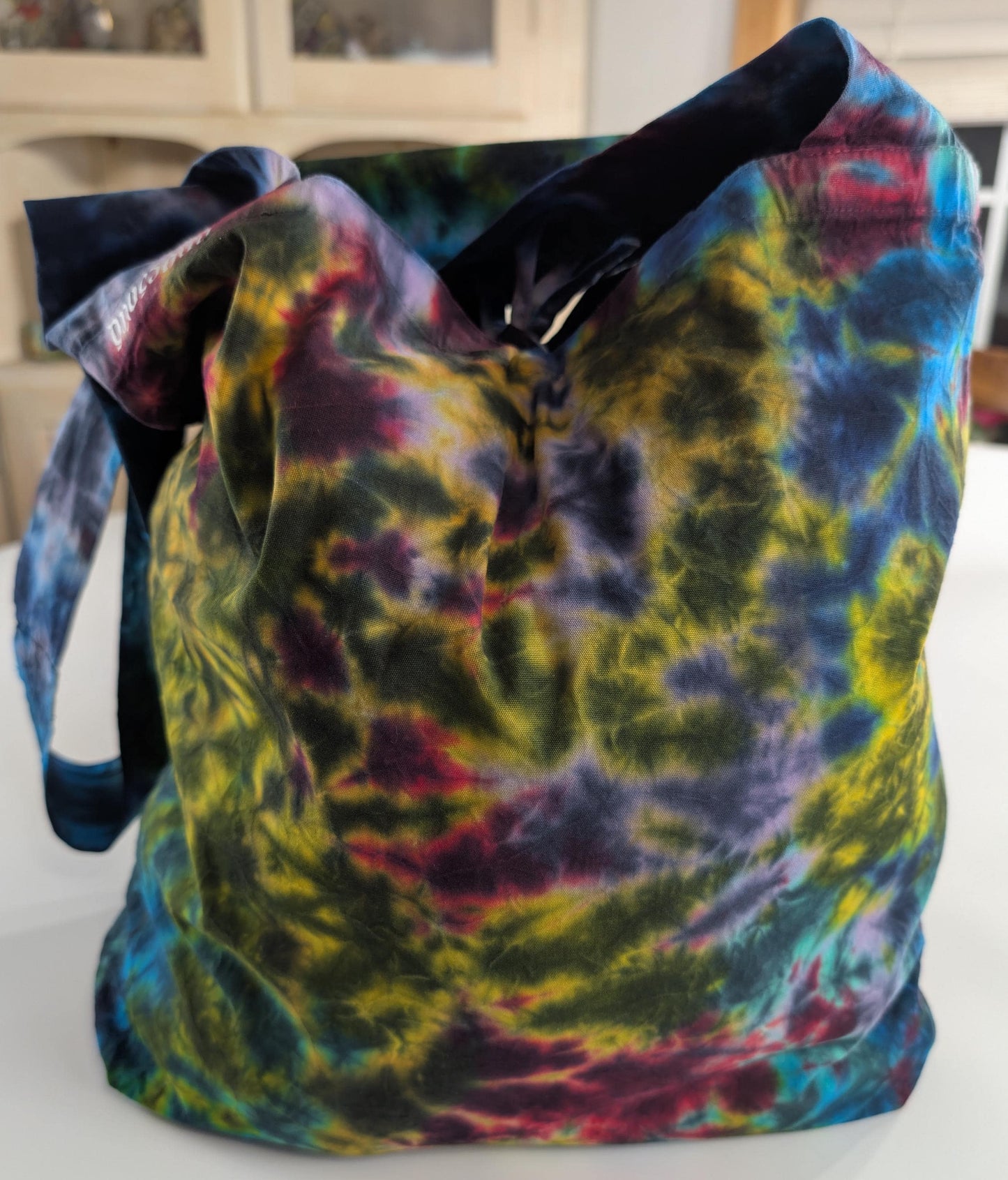 Blacked out Rainbow Rorscach Scrunch Tie Dye on a Dharma Trading Company Cotton Hobo Bag