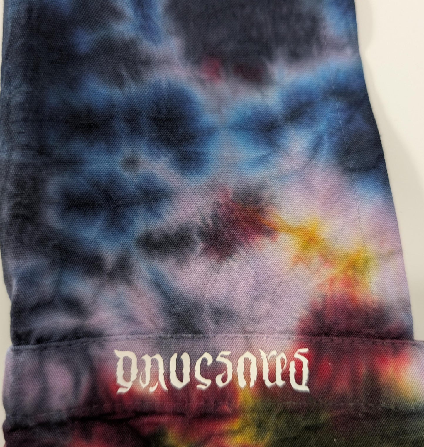 Blacked out Rainbow Rorscach Scrunch Tie Dye on a Dharma Trading Company Cotton Hobo Bag