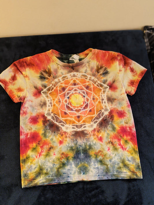 Child size 7 Hot water irrigation mandala tie dye on t-shirt.